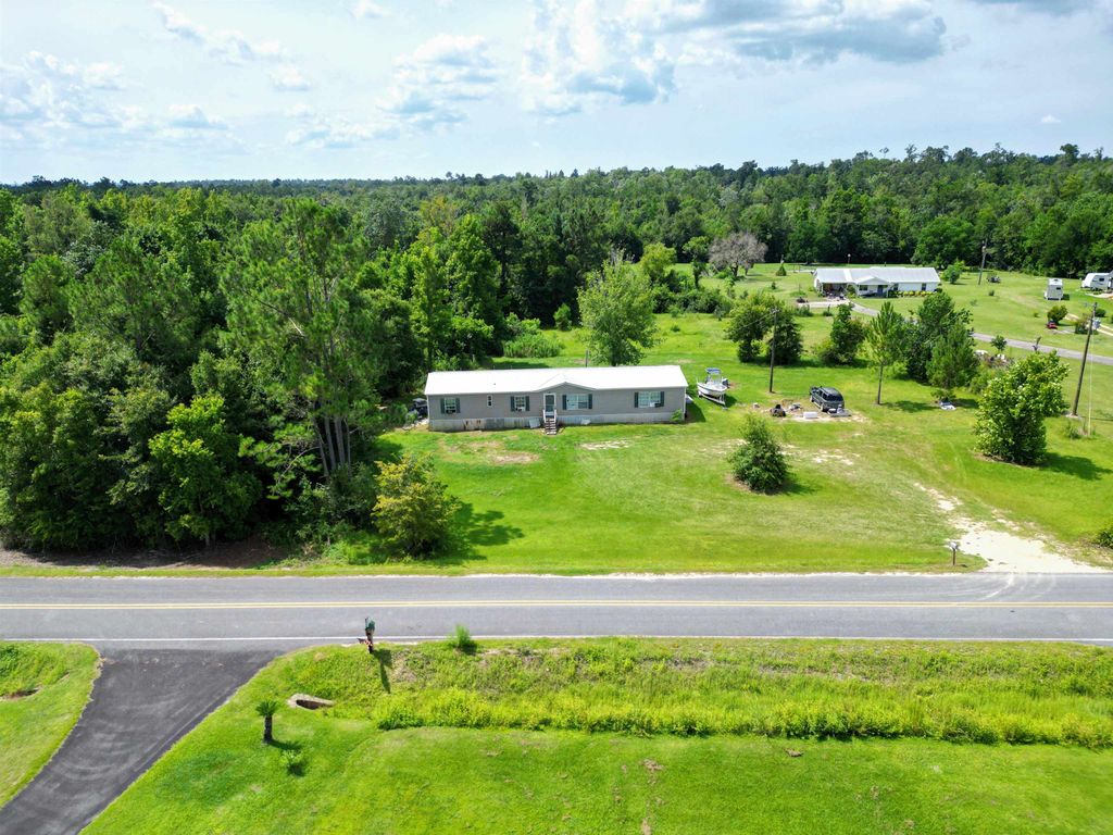 Photo of 20655 NE Parrish Lake Road, Blountstown, FL 32424 (MLS # 389207)