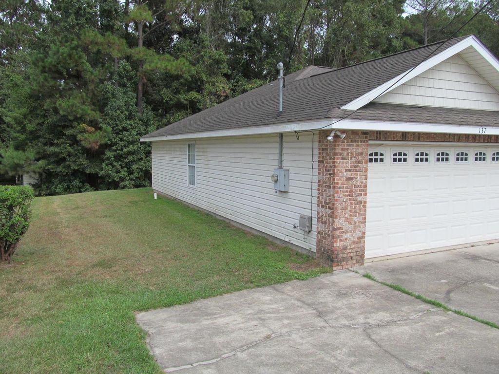 Photo of 137 Monroe Creek Drive, Midway, FL 32343 (MLS # 392033)