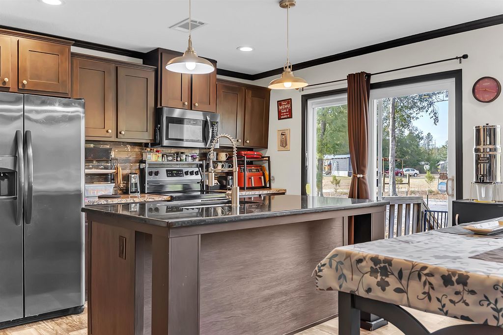 Photo of 616 NE Hillside Terrace Street, Lee, FL 32059 (MLS # 395276)