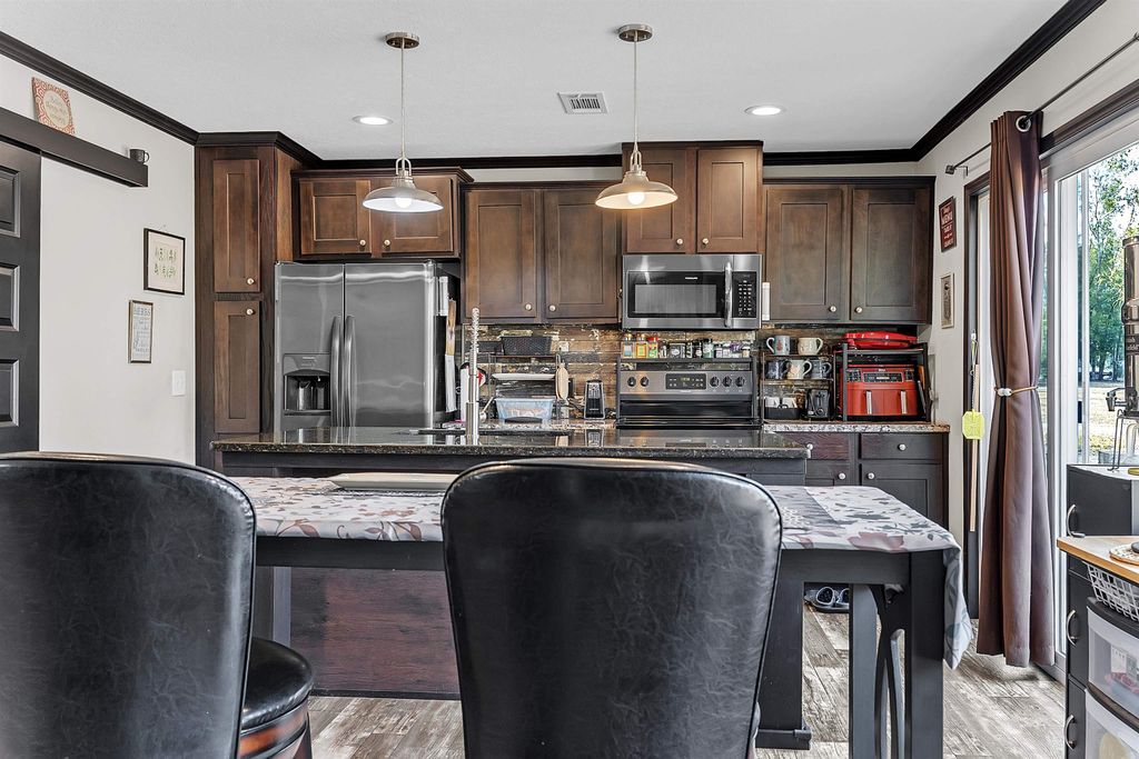 Photo of 616 NE Hillside Terrace Street, Lee, FL 32059 (MLS # 395276)