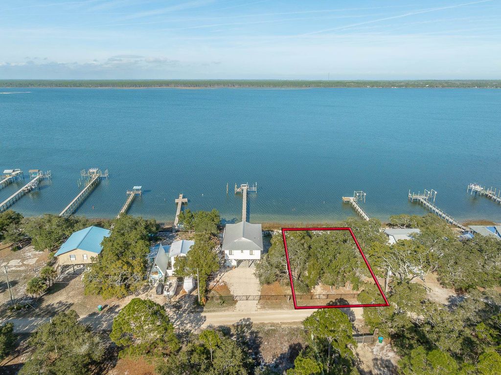 Photo of 201 Harbor Circle, Alligator Point, FL 32346 (MLS # 398265)