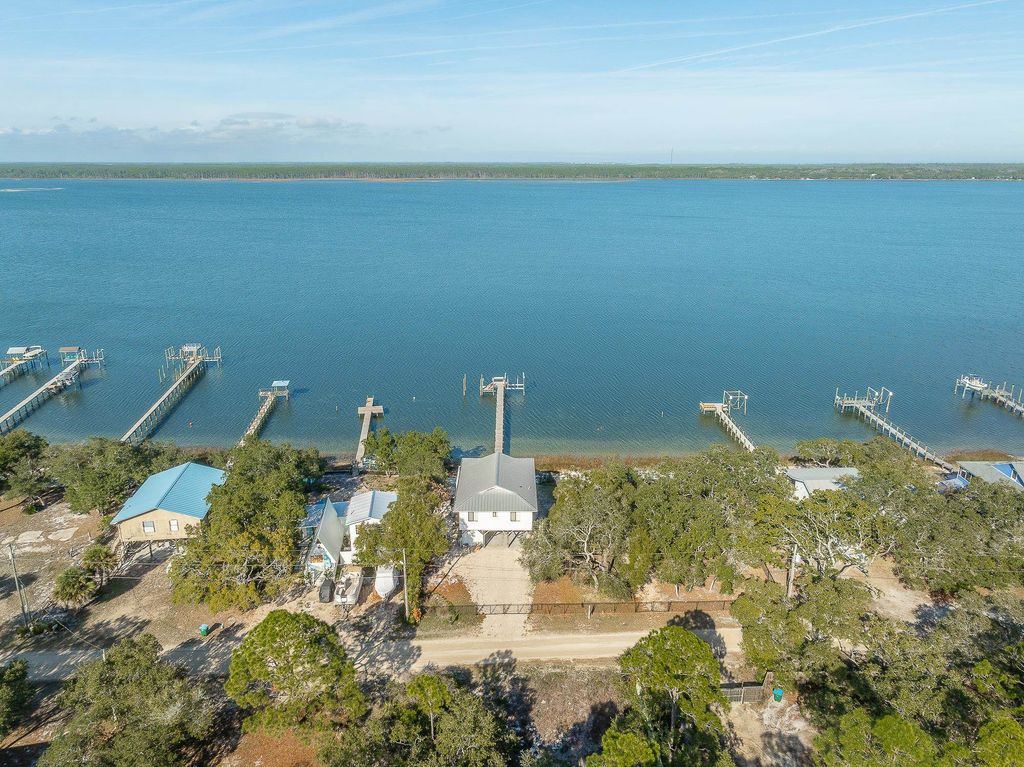 Photo of 201 Harbor Circle, Alligator Point, FL 32346 (MLS # 398265)