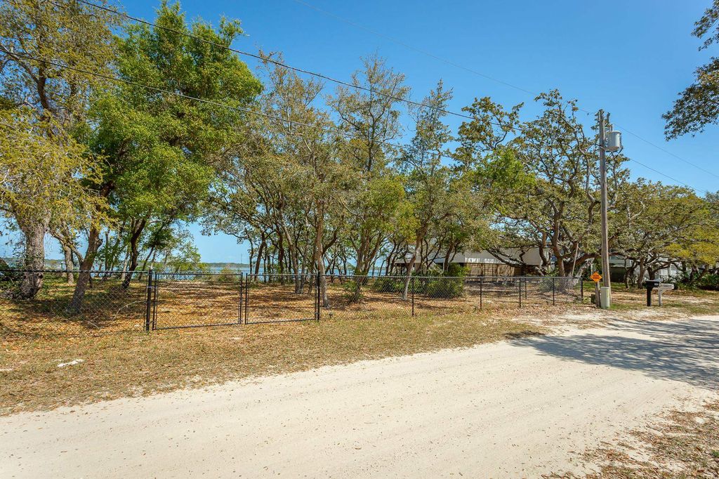 Photo of 201 Harbor Circle, Alligator Point, FL 32346 (MLS # 398265)