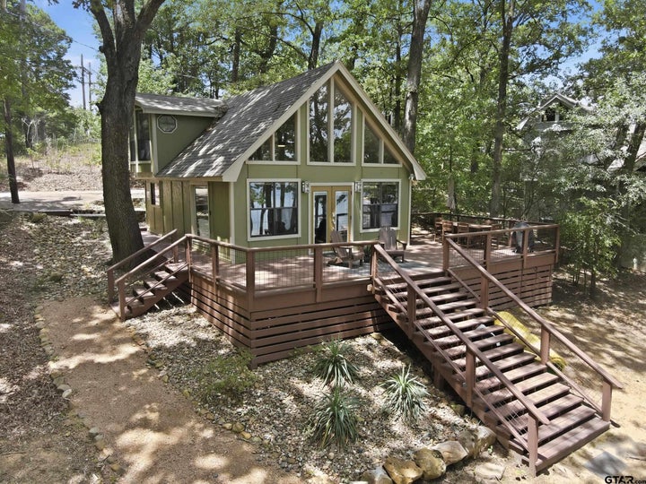 Photo 1 of 32 — 104 E Barker Creek Dr, Scroggins, TX 75480