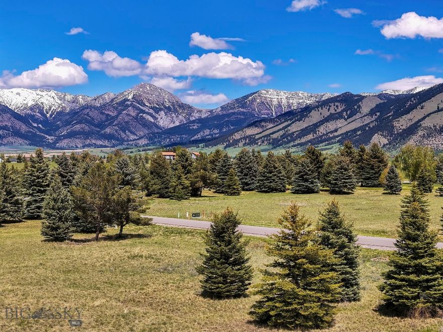 Located within the peaceful Bridger Lake Meadows subdivision, this 1.328± acre lot offers a rare opportunity to create your dream property at waters edge. Lot 5902 is oriented with a southwest view corridor towards Spanish Peaks and borders a small park which protects the lot from the street corner. Overlooking the stunning lake at Bridger Lake Meadows, the property also includes private access to a 25+ acre nature park and the East Gallatin River—perfect for those who appreciate both beauty and outdoor recreation. Ideally positioned just 10 minutes north of 19th Avenue in Bozeman, this homesite provides the perfect balance of quiet living and convenient access to city amenities. With sweeping views, access to trails and riverfront spaces, and a prime location close to Bozeman, this property represents an exceptional piece of Montana living. Lot 5902 could be combined with Lot 5912 (MLS 410936) creating over 2 acres of lake front living.