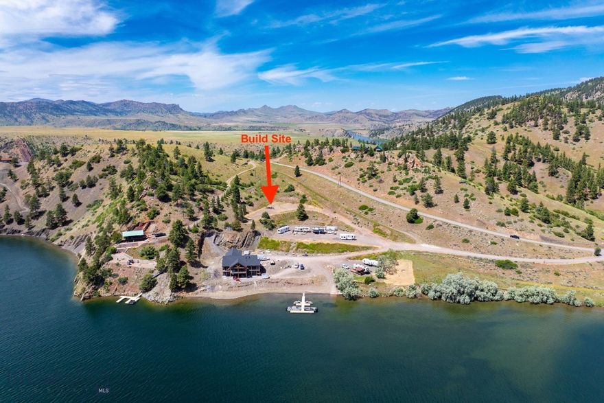 Amazing piece of land at Holter Lake! This rare property with lake access is BUILD READY with over $250,000 of infrastructure completed. Wells completed! Septic systems completed! Electricity to the sites completed! This property features private a boat launch, private beach, and is secured in the Holter Heights development. Come and build your dream home with seller financing options available. Call to schedule a tour and ask about these great financing options or your real estate professional. Building in photos is an example of what could be built on the lots and is not for sale.