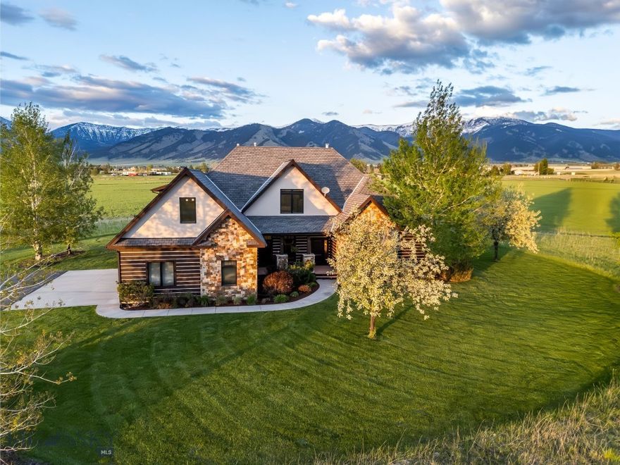 Celebrate Montana life in this timeless Montana home, where rustic elegance meets thoughtful functionality. Located on a private cul-de-sac, with breathtaking views of the Bridger range, the rural landscape is only minutes to Bozeman, the Yellowstone International airport, miles of recreational trails and Bridger Bowl ski area. The heart of the home is the chef's kitchen, featuring new granite countertops, premium appliances, farmhouse sink, a dining area and inviting sitting area-perfect for casual gatherings or quiet mornings. A stunning moss rock fireplace anchors the family room, creating a warm and welcoming space to enjoy the long winter months. New Montana hickory floors flow throughout much of the main level, adding a rich warmth. The spacious primary suite offers a luxurious escape with a jetted tub, rejuvenating steam shower and access to the back deck. The main level is complete with a designated office and fully appointed mother-in-law suite. Upstairs, two additional bedrooms share a Jack and Jill bath and are complemented by two versatile bonus areas-ideal for hobbies, play or relaxation. Enjoy seamless indoor-outdoor living with a covered patio, covered porch and sprawling deck, all designed to maximize the panoramic mountain views. Numerous updates include a new dishwasher, furnace, microwave, kitchen counters and floors. Exterior was recently stained. A heated garage ensures comfort throughout the seasons. This is Montana living at its finest-private, picturesque and perfectly appointed.