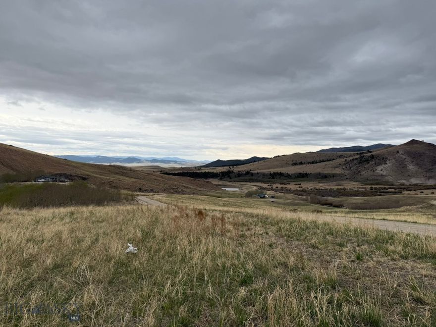 Spanning over 27 acres, this property offers panoramic views of the Pintler Mountain region and valley.  Located about 15 minutes from Anaconda.   It offers a natural water spring flowing through the property, attracting frequent wildlife visitors.  A great all season recreation area and conveniently located near public lands.