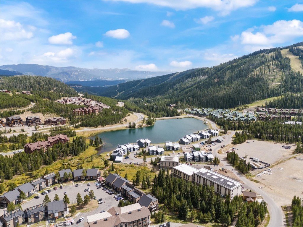 Welcome to Unit 1190 – St. Moritz Building | 440 SQ FT End-Unit Studio with Lone Peak Views
Discover effortless mountain living in this well-designed end-unit studio located in the sought-after St. Moritz Building, conveniently located near Big Sky Resort. Set against the breathtaking backdrop of Big Sky Country, Unit 1190 offers the ultimate basecamp for year-round alpine adventures.
This efficient 440 square foot studio features thoughtfully updated finishes, and two large windows that fill the space with natural light and capture the peaceful sound of the adjacent babbling creek, which flows into nearby Lake Levinsky. Step out onto your deck and enjoy unobstructed views of Lone Peak— perfect for morning coffee or relaxing after a day outdoors.
The interior includes a modern kitchen, updated bathroom, and a versatile living/sleeping area designed for both comfort and functionality. Recent building upgrades, including new siding and roofing, enhance long-term value and curb appeal.
Positioned alongside a scenic walking trail and the tranquil creek, this unit also offers easy access to the new Big Sky Resort Explorer Gondola, set to open in winter 2025. As the closest Hill Condo to the new Gondola, it provides unmatched access to world-class skiing, biking, and mountain recreation right from your doorstep.
In addition to its comfort and location, Unit 1190 also boasts a robust rental history, making it an excellent opportunity for investors or buyers seeking income potential.
Whether you're looking for a weekend escape, a full-time home, or a smart investment, Unit 1190 delivers comfort, convenience, and authentic alpine charm in one exceptional package.
