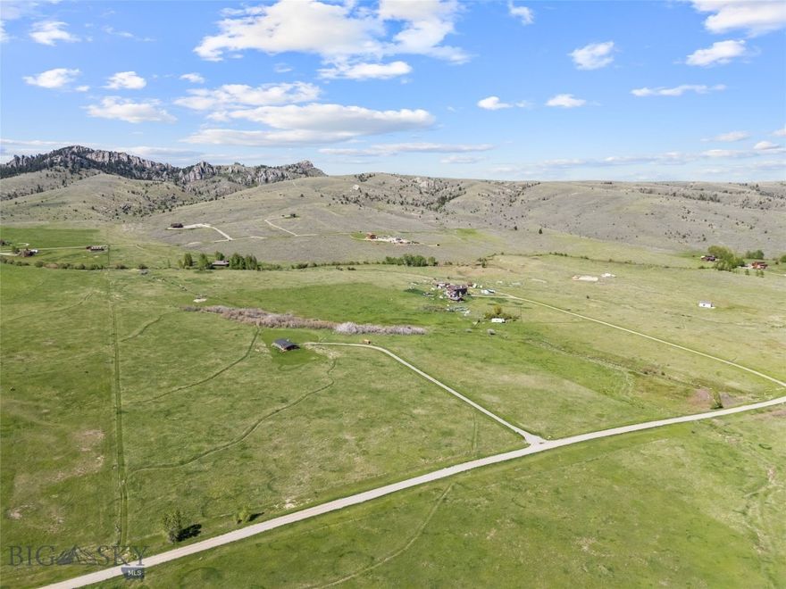If you're seeking privacy, space, and mountain views, look no further. This prime 5-acre lot in McAllister is nestled between the Madison and Tobacco Root Mountains, offering nice mountain views and a tranquil setting. The land is flat and usable, perfect for building your custom home or weekend retreat. Located just 20 minutes from Ennis and  an hour to Bozeman, you’ll have quick access to both small-town charm and city conveniences.