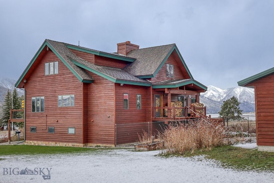 Set just across the street from Hebgen Lake with sweeping lake views and room for everyone, this spacious 3,845-square-foot mountain home offers the ideal blend of comfort, functionality, and year-round recreation. Built in 1999 and thoughtfully designed across three levels, the home features four bedrooms, four and a half bathrooms, and inviting gathering spaces throughout.
At the heart of the home is a warm and welcoming great room with a wood-burning fireplace, vaulted ceilings, and large windows that capture the beauty of the lake and surrounding landscape. The chef’s kitchen is designed for entertaining, flowing seamlessly into a cozy dining area and out to an expansive deck built for summer barbecues, outdoor dining, and evenings spent taking in the views.
The large yard provides plenty of space for kids, pets, and outdoor games, while the indoor hot tub offers the perfect place to unwind after a day on the water or trails. With both an attached two-car garage and a detached two-car garage, there is ample room for vehicles, boats, snowmobiles, and all your Montana adventure gear.
Located just a two-minute drive from Kirkwood Marina, this property delivers easy access to boating, fishing, and endless outdoor recreation while offering the privacy and comfort of a true mountain retreat.