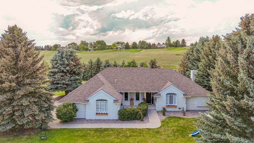 Welcome to your dream home in the coveted Sypes Canyon area—where modern luxury meets Montana’s natural beauty. This stunning 4-bedroom, 3.5-bathroom home spans 4,150 square feet and is perfectly situated on 1.725 acres, offering breathtaking mountain views and serene privacy. |Basement bedroom is non conforming|
Step inside to find soaring ceilings, abundant natural light, and a thoughtfully designed layout that blends contemporary elegance with warm, livable spaces. The large kitchen with double wall oven, mini bar and ample cabinet space makes entertaining a breeze while the private office allows for a quiet retreat. The large master suite features a luxurious glass and tile shower and spacious walk-in closet. Also on the main level are a laundry room and mud room, 2 additional bedrooms and bathroom. The finished walk-out basement offers excellent storage, an additional living area, extra bedrooms with a full bathroom and a designated space for hobbies, workouts, or entertainment. 
The heart of the home features open living areas perfect for gatherings, while the outdoor hot tub and wood-burning sauna add a unique, spa-like touch—ideal for unwinding after a day on the trails or slopes. The modern kitchen, large windows, and clean lines create a bright and inviting atmosphere throughout.
Outdoors, you’ll enjoy mature landscaping with underground sprinklers, a large deck, a three-car garage, and a secure underground dog fence—all surrounded by the tranquility of nature and panoramic vistas.
This property is a rare find in one of Bozeman's most sought-after locations, combining space, style, and convenience.