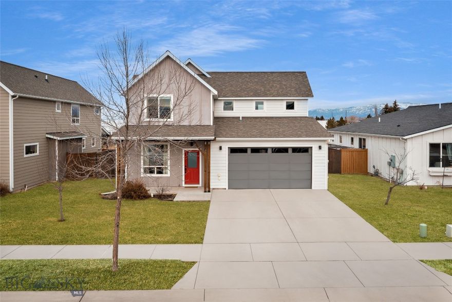 This bright and inviting 3-bedroom, 2.5-bath home offers an open thoughtfully designed layout ideal for spacious everyday living with comfortable well-appointed spaces. The main level flows seamlessly from the dining area into the kitchen and living room where upgraded finishes take center stage~ stone countertops, stainless steel appliances, a tiled backsplash and feature wall and a limestone fireplace with a rustic wood mantel. Reclaimed wood accents in both the dining and living spaces add warmth and character throughout.

Upstairs the spacious primary suite feels like a true retreat complete with a generous walk-in closet and a beautifully finished bath featuring white shiplap accents, a double vanity, and tiled floors. Two additional light-filled bedrooms and a well-appointed full bath complete the upper level.

Step outside to the covered back patio overlooking a large fully fenced backyard designed for both relaxation and entertaining. Enjoy a stone retaining wall, raised planters, and a cozy fire pit, perfect for Montana evenings. The yard offers added privacy along with mountain views while the south-facing driveway provides everyday winter convenience.

Fresh interior paint and thoughtful upgrades throughout make this home truly move-in ready. An attached two-car garage and ample storage add to the home’s functionality.

Located in Gooch Hill Meadows off Huffine Lane, this home offers easy access to neighborhood parks, trails, and minutes from the amenities of Four Corners and Bozeman.
