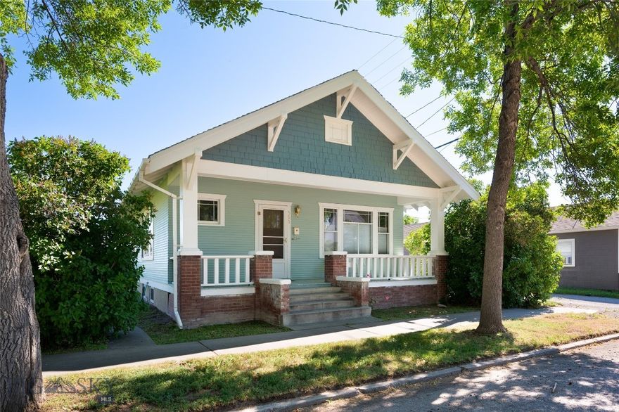 Welcome to 323 E Morse Street in Dillon, Montana—a beautifully maintained Craftsman-style home that perfectly blends timeless character with everyday comfort. From the moment you arrive, you’ll appreciate the inviting covered front porch and mature landscaped yard, setting the tone for what’s inside. This charming home offers a total of 1,748± square feet, with 874 square feet on the main level and an additional 874 square feet in the finished basement. Inside, you’ll find original hardwood floors, rich crown molding, and stunning built-in cabinetry complete with original hardware—preserving the craftsmanship and detail of its era. Natural light fills the home, creating a warm and welcoming atmosphere throughout. The main level features a convenient primary bedroom, along with a formal dining room ideal for gatherings. Ceiling fans add comfort and efficiency.

The lower level provides a fully functional additional living space, complete with a full bathroom,  a nonconforming bedroom with an egress window, a kitchen, comfortable living area, and dedicated laundry space. With its own setup and a history of being rented separately from the main level, this space offers excellent potential for supplemental income, guest quarters, or multi-generational living. Step outside to a private, fenced backyard—perfect for relaxing, entertaining, or pets. The property also includes an original carriage house, offering versatile space for storage, 4-wheelers, or hobby use. The ally access gives you off street parking or build a garage which can be accessed from the alley. Located just minutes from University of Montana Western and downtown Dillon’s dining and amenities, this home offers both convenience and charm. An exceptional bonus: two additional lots are included, providing incredible investment potential. With C-3 zoning, the possibilities are wide open—expand with another residence, create a business space, or explore multi-family development opportunities. Whether you’re looking for a charming residence, an income-producing property, or future development potential, this unique offering delivers it all.