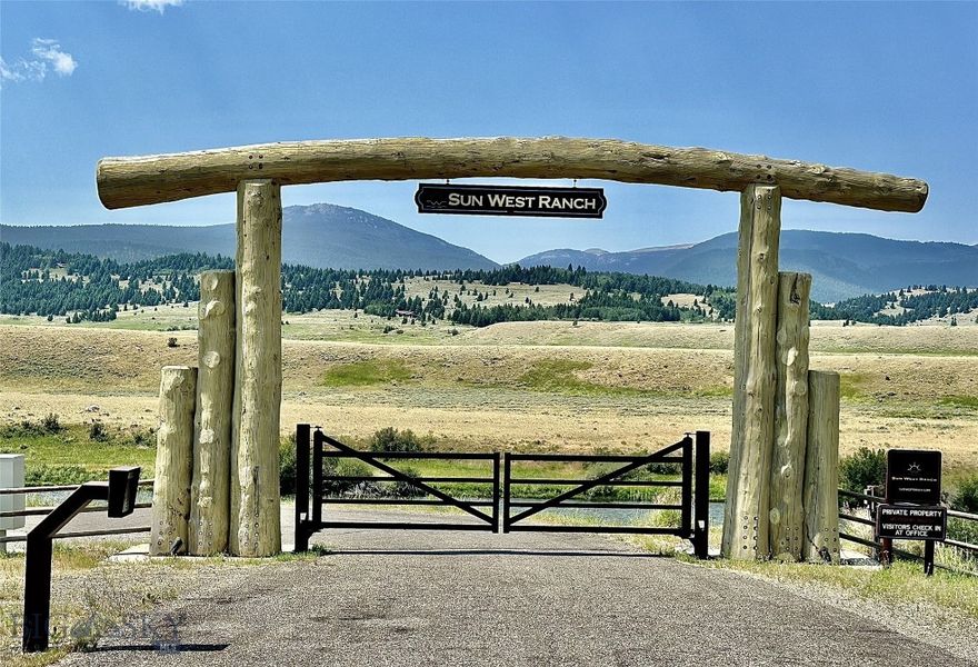 Year round accessible parcel with gorgeous views of the valley below, the mountains above, and 3 miles of the Madison River that is accessible to landowners in Sun West Ranch.  This gated community offers many additional amenities including an Equestrian Center (outdoor arena, round pen, horse barn with tack storage, summer horse program), hiking trails, stocked ponds for fishing, access to hunting, and 1600 open acres for a viewshed.  You are located within one of Montana's great recreational area as you are less than 30 minutes to Yellowstone National Park and just a few minutes to multiple lakes for more water sports.  Enjoy your day everyday as the full time Ranch Managers maintain this exclusive paradise for you giving you the time to just relax and soak in the massive mountain views!