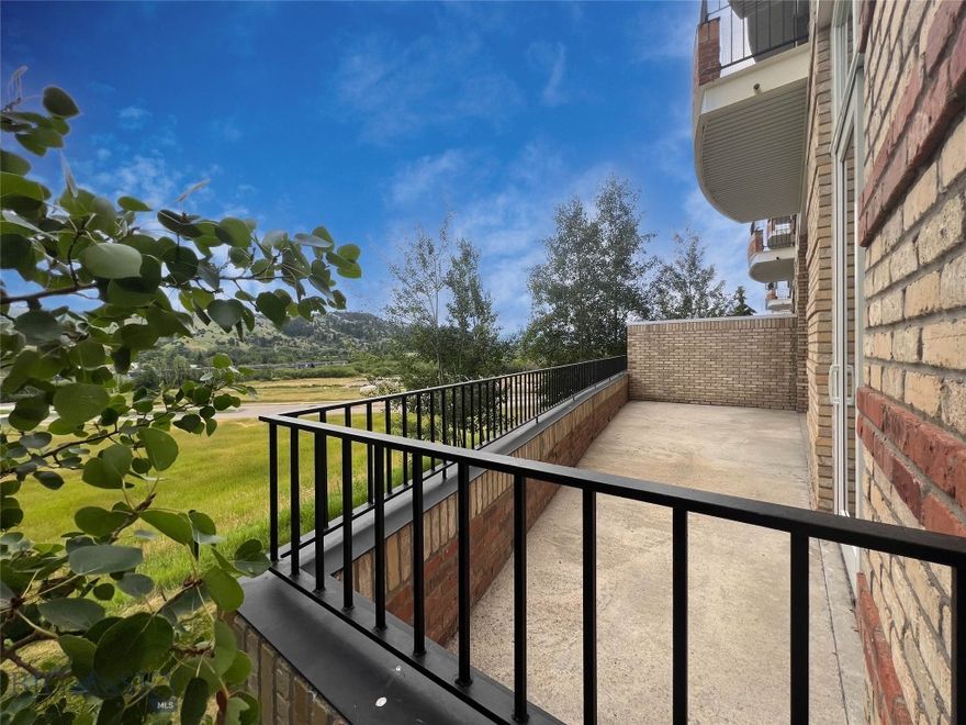 Live and play in the heart of beautiful Downtown Bozeman. This 2-bedroom, 2-bath Village Downtown condo offers 1,414 square feet of effortless living paired with stunning mountain views and a walk-out patio that enhances everyday enjoyment. The open floor plan is ideal for both relaxing and entertaining, while the spacious primary suite features a generous bathroom and dual closets for comfort and convenience.

Designed for a true lock-and-leave lifestyle, The Village Downtown is a sought-after, maintenance-free community that blends style, location, and ease. Step outside and walk to downtown shops and restaurants, the library, trail access, and nearby parks. The patio provides seamless indoor-outdoor living and is perfect for pet owners.

Additional features include a heated, lighted, and secure underground garage with a private storage unit—everything you need to enjoy Bozeman living at its best.