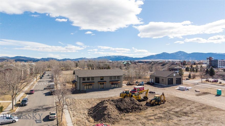 This ground-level retail unit is delivered in vanilla shell condition, offering an ideal opportunity for a tenant to fully customize the space to suit their needs. The adjacent unit will be occupied by a rafting & tubing business, making this location an excellent complement to an outdoor sporting or recreation-oriented business. The unit features a private restroom, kitchenette, and ample on-site parking for customers and staff.