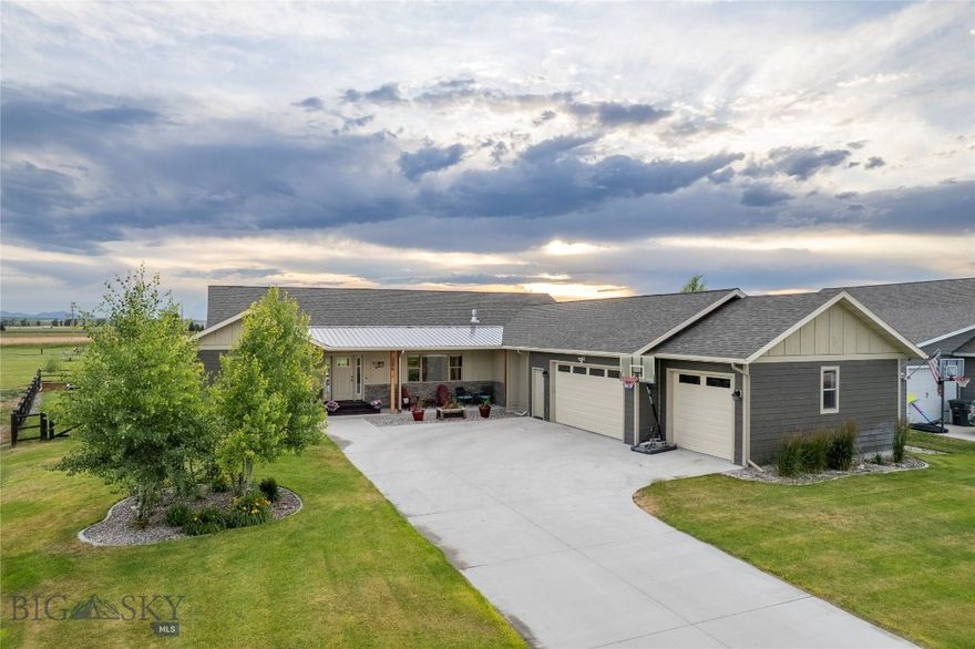 This beautifully crafted ranch-style home offers 4,233 sq ft of refined living space on a generous .41-acre lot, with open space in both front and back and direct views of the neighborhood park. Built with attention to detail, the home features 6 bedrooms, 3.5 bathrooms, and a main-level primary suite. High-end finishes include custom alder cabinetry, trim, solid wood doors, and built-in custom storage throughout. The open-concept main floor (2,677 sq ft) includes a dedicated office, large mudroom, and a stylish kitchen with quartz countertops and stainless appliances. The fully finished basement includes two additional bedrooms, a second large living area, a wet bar, and a built-in sound system with speakers—ideal for hosting, relaxing, or multi-generational living. Step outside to a landscaped yard with a gazebo, garden beds, and views that stretch across open space. A 3-car garage provides ample storage. Even better, the property is zoned for an ADU, giving you the flexibility to add future guest quarters, a rental unit, or in-law suite (buyer to verify with the Town of Manhattan). Located in desirable Pioneer Crossing, this home blends small-town charm with thoughtful design—just minutes from downtown and I-90. Seller is a licensed realtor in the State of Montana.