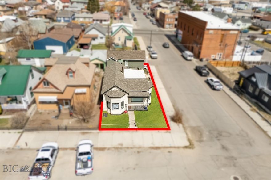 This property presents an excellent investment opportunity with two rental units. The front home, facing Wyoming Street, features two main-level bedrooms, including one with stairs leading to a smaller loft-style bedroom, a large living room, dining area, spacious kitchen, and a bathroom/laundry room combination. The second unit, a shotgun-style brick home facing First Street, is all one level and comfortably sized, featuring a bright living room flowing into the bedroom and kitchen, which offers ample cabinet space and room for a dining table. Additionally, this unit comes with a private parking spot and is rented fully furnished. For those interested, showings are available with a 24-hour notice required. The larger home facing Wyoming is vacant, making it a perfect situation for an owner to live in one and keep the second rented. Some photos have been digitally altered by removing items and/or enhancing the landscape for the purpose of presentation. The property qualifies for soil mitigation/new lawn through the residential metals abatement program. Set to begin in September 2025.