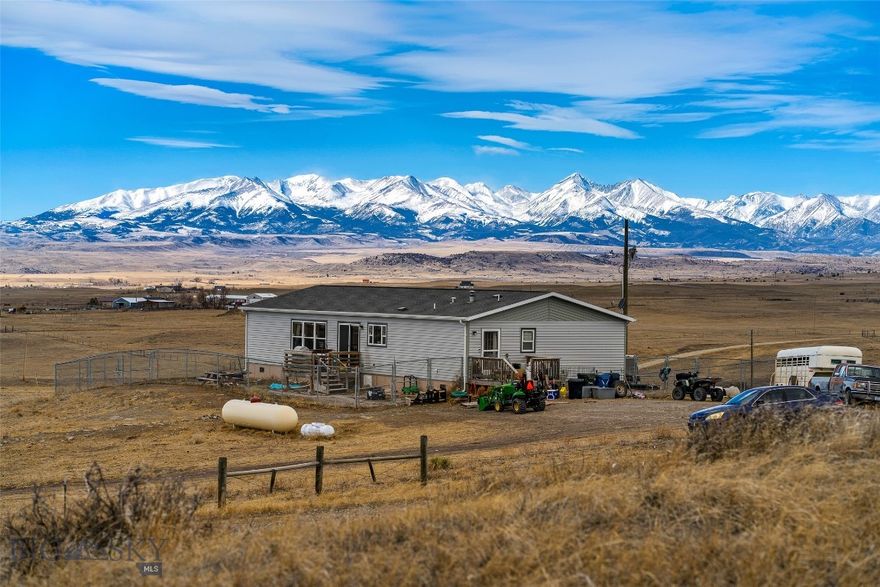 Come see an incredible value in Big Timber! On just over 20 acres that frames the Crazy mountains, bring your horses and enjoy 4 bedrooms and 2 bathrooms with stunning views throughout. There is an outbuilding for livestock and plenty of room for a hobby farm or whatever you desire. Stay cool with AC in the summer. The seller is also offering $10000 credit with an accepted offer. Don't miss an opportunity to own a piece of Montana in a great location.