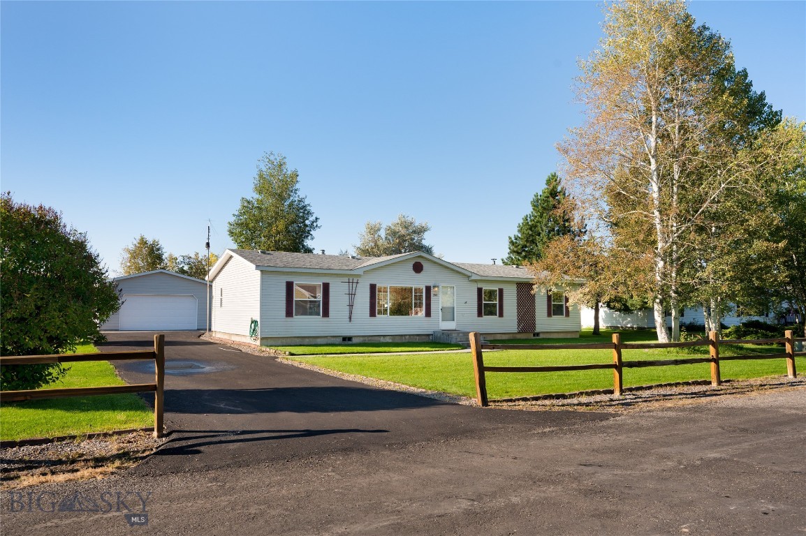 Discover this inviting 3-bedroom, 2-bath home nestled on a beautifully landscaped half-acre lot with mature trees. Backing to HOA open space, this property offers privacy, expansive views, and a peaceful neighborhood setting.
The outdoor living is a true highlight—enjoy a covered deck, evenings by the fire pit, and two large raised garden beds ready for the gardening enthusiast. A detached 2-car garage with shop space, plus a separate storage shed, provide plenty of room for tools, toys, and hobbies. A brand-new asphalt driveway was just completed in August 2025.
Inside, a thoughtful floor plan features a spacious kitchen, while the cozy living room with a wood-burning stove sets the tone for relaxing nights. Two comfortable bedrooms and a full bath are tucked nearby, while the private primary suite enjoys its own ensuite bath. The laundry and mud room offers direct access to the backyard deck, seamlessly blending indoor and outdoor living.
For added peace of mind, the home is equipped with a Pentek “Big Blue” two-stage carbon filtration system and a Polaris ultraviolet disinfection system.
With charm, space, and potential, this home is ready to make your own—schedule a showing today and come see this incredible property for yourself.