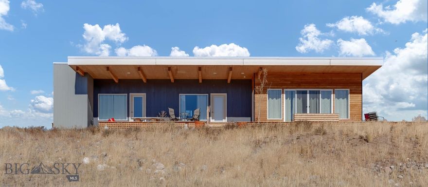 Perched high up on a scenic corner lot with over 3 acres of gently rolling land, this modern 2 bed, 2 bath home offers stunning panoramic views of the Yellowstone River, and the breathtaking Paradise Valley landscape.  Inside, the home is fully turn-key.  Clean, comfortable, and move-in ready—ideal as a full-time residence, vacation home, or income-producing property.  Currently operating as a successful short-term rental, this property boasts a strong rental history with established income, offering immediate value for those looking to invest in Montana’s thriving vacation market.  Located just minutes from the charming town of Emigrant, 20 minutes from the north entrance of Yellowstone National Park, and 30 minutes to Livingston, the home offers both seclusion and convenience. Year-round access and proximity to world-class fly fishing, hiking, and hot springs make this an ideal basecamp for adventure—or a peaceful escape to simply take in the views.