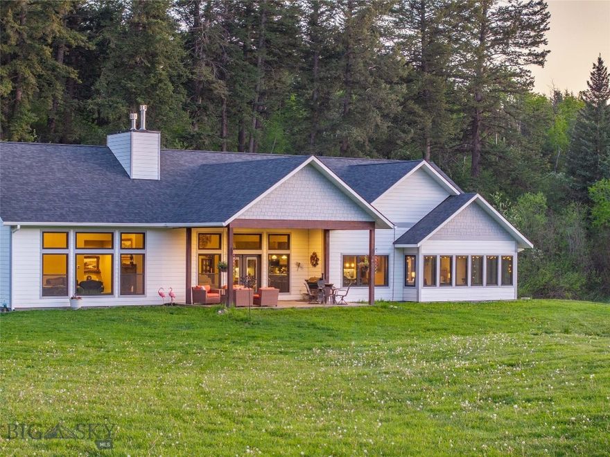 Tucked off a quiet road just minutes from Bozeman, this 22.6± acre property offers a rare combination of privacy, water frontage, and multi-residence flexibility. Set among mature trees with South Cottonwood Creek running through, the land feels like your own private park—secluded, serene, and full of natural beauty. The 4,184± SF custom 4-bedroom main home was built in 2020 with thoughtful design and refined finishes, including vaulted ceilings, engineered wood floors, a gourmet kitchen, gas fireplace, and a spacious main-level primary suite. Two additional bedrooms on the main level and a large bonus room with an extra bedroom upstairs provide plenty of space for family and guests. The 4-car garage provides plenty of space to store vehicles and all the your Montana lifestyle gear. The property also features a charming 2-bedroom, 1-bath guest cabin with a full kitchen, laundry, and cozy living area—ideal for visitors, multi-generational living, or rental income. Recreation is at your doorstep. Just 5 minutes to the South Cottonwood Trailhead, you’ll have quick access to miles of hiking, biking, and exploring in the Gallatin Range. The timbered upper portion of the property is a natural playground for kids and adults alike—perfect for hiking, camping, and adventure. There’s even an old picnic spot at a bend in the creek where locals once gathered, adding nostalgic charm to the landscape. Despite its tucked-away feel, the property is only 20 minutes to Downtown Bozeman, 30 minutes to the airport, and within easy reach of skiing, fishing, and public lands. With no covenants and abundant wildlife, this is a true Montana retreat—ideal as a full-time residence, vacation home, or legacy property to enjoy for generations.
