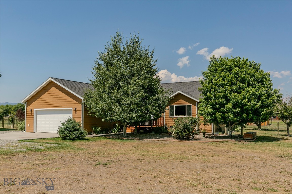 SIGNIFICANT PRICE REDUCTION - MOTIVATED SELLER -- Enjoy country living just minutes from downtown Livingston! Built on a full acre with mountain views, this 5-bedroom, 3-bath home has a generous layout with space for living, working, and recreating. It’s horse-ready with a 60 GPM well, barn, shed, and fenced areas, plus there’s an attached 2-car garage and plenty of room to spread out. Inside, you'll find 3 bedrooms and 2 full baths on the main floor, along with a bright kitchen and an open living room with a cozy fireplace. Downstairs, the finished basement features two additional bedrooms, a full bathroom, and a large bonus room, perfect for guests or hobbies. This is a great opportunity to own a versatile property with space, views, and convenience at a great value. The sellers need to move soon to start a new job, so bring your offer!
