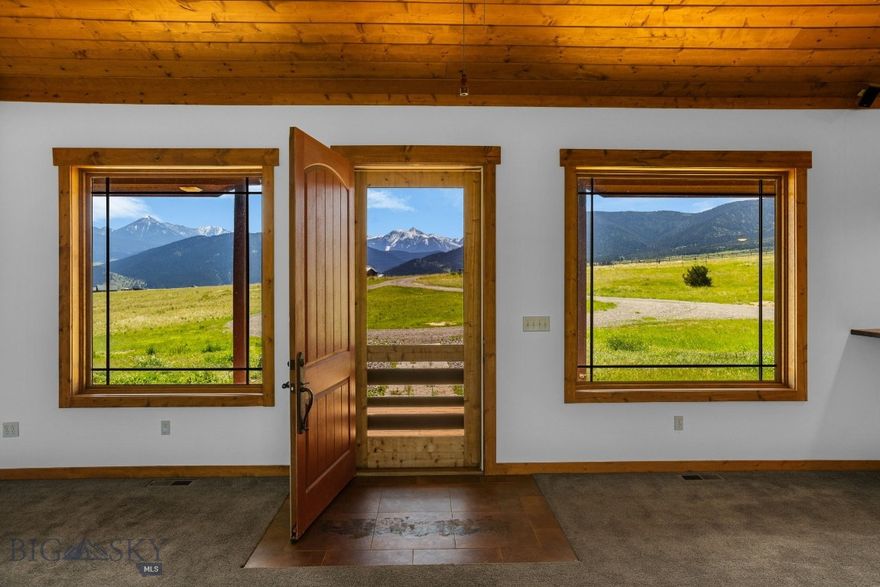 Discover wide-open Montana living in Buffalo Trails Estates, located just to the south of Livingston! This spacious home offers vaulted ceilings and an open-concept design, with a wraparound deck showcasing sweeping mountain views in every direction. The expansive primary suite features a spa-like ensuite with a jetted tub, tiled shower, and a massive walk-in closet. Enjoy the convenience of a walk-out basement, a freshly painted main level, and a newly stained wood exterior. The lower level includes two additional bedrooms (non-conforming due to lack of closets) with egress windows, perfect for guests, an office, or hobby space. Outdoors, this property is ideal for horse owners, with average lot sizes of 10 to 20 acres in the subdivision, ensuring privacy and elbow room. The oversized garage accommodates up to four vehicles—or your camper, drift boat, and more. Additional highlights include air conditioning, forced-air heat, a durable metal roof for peace of mind and lower insurance rates, and incredible views no matter which window you're looking out of. Be sure to view the 2D floor plans in the photo section to fully appreciate the layout of this inviting Montana retreat!