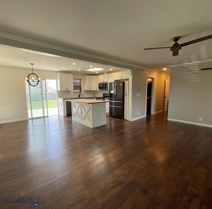 Charming home in great location. This home has been recently remodeled with a modern farmhouse style kitchen, butcher block island and open floor plan to the living room and dining area. Three bedrooms are located on the other side of the house, including the primary bedroom with en-suite bath. The modern primary bath has two vessel sinks, new tile, and a walk in shower. The second bathroom also has a large dual vanity, separate door to shower and toilet. All new electrical has been added to the home including a 200 amp panel, new plumbing done with PEX, Upgraded lighting, and USB. Enjoy summer entertaining off your deck and large back yard.