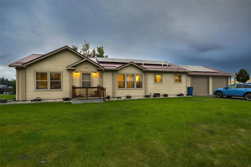 Check out this immaculate home on a large, pristine lot! A classic 3 bedroom, 2 bath home with large deck for entertaining and a beautiful lawn with underground sprinklers. The master bath has a great soaking  tub and plenty of space. A large garage can be used as a workshop and to store your cars/toys. A nice little parkland playground area is just next door. Solar has been installed on the home and provides enough power to also run back some into the grid. This 2016 home has been taken care of and is ready for your family!