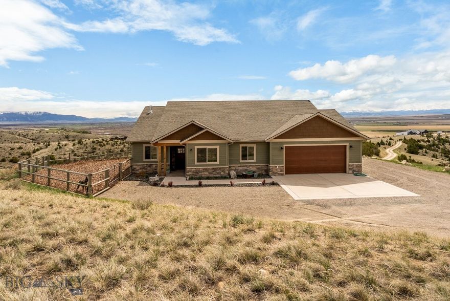 Rare opportunity to own a single level rancher on a premier lot in GRR, perched high
above the valley, with views of five mountain ranges, in all directions. Great floor plan
with open kitchen, dining and great room complete with vaulted ceilings and a propane
stove. Expansive kitchen with plenty of work surfaces, quartz countertops, and black
stainless GE Cafe series appliances. Incredible southern exposure and large windows
flood the interior with natural light, while bringing the outside in. Primary suite with
beautiful soaker tub and walk-in shower, dual sinks, and spacious closet with custom
storage. Located opposite the primary suite, are 2 additional bedrooms, a full bathroom,
as well as an office, or 4th bedroom. Oversized, insulated and finished 2 car garage
complete with EV charging station, and nearly 300 square feet of unfinished insulated
storage space above, that could allow for additional finished space. 10kW Solar array
allows for an essentially zero power bill every month! Low maintenance living, with
durable exterior materials, xeriscape landscaping, make this a near lock and leave
opportunity for you! Endless area amenities including an equestrian facility located
within the ranch, river access to the Gallatin and East Gallatin Rivers, and miles of trails
right out your door. 20 minutes from Bozeman Yellowstone International Airport, 30
minutes to Bozeman , an hour from Big Sky and two hours from Yellowstone National
Park, this property offers the conveniences of being close to town, yet in a rural setting.
Take in the night time stars, ever changing sunsets and sunrises, and vibrant northern
lights displays. Abundant wildlife frequent the property and the area including deer, elk,
birds of prey, and pheasant. The charming town of Manhattan is 10 minutes away,
complete with conveniences such as grocery store, restaurants, coffee shops, park, and
schools. High speed internet is available at the home as well! Close to incredible fly
fishing and skiing that Montana is renowned for, as well as golf, hiking, and endless
outdoor opportunities. Come and enjoy all Montana has to offer at your new base camp
at 100 Saddle Ridge!
