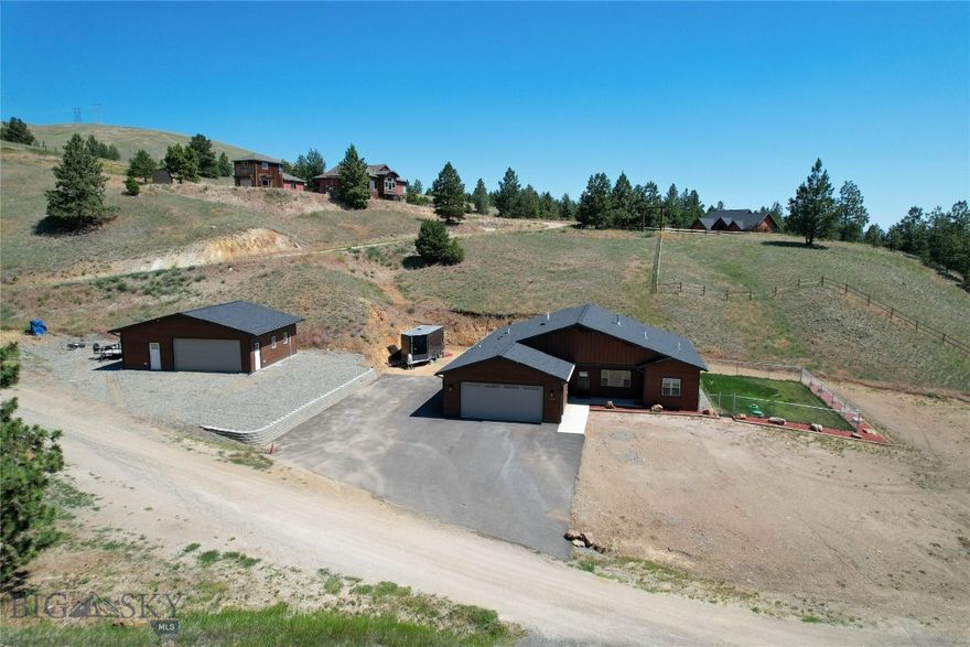 Welcome to 158 Jackson Creek Road in Montana City—where space, function, and freedom meet. Built in 2021, this beautifully designed 3-bedroom, 3-bath home offers 1,825 sq ft of open-concept living on a spacious 1.43-acre lot.
Enjoy a thoughtfully laid-out floorplan with the primary suite featuring a walk-in shower, soaking tub, and generous space for comfort and relaxation. The additional bedrooms are located in a separate wing, providing privacy for family or guests. Car enthusiasts, hobbyists, or anyone needing space will love the oversized two-car garage and the fully finished shop—complete with an office area and ample storage for tools, toys, and gear. Outside, you'll appreciate plenty of parking for trailers, a fenced dog run, and the wide-open Montana sky that surrounds you. Don't miss your chance to own this ideal Montana property. Schedule your showing today!