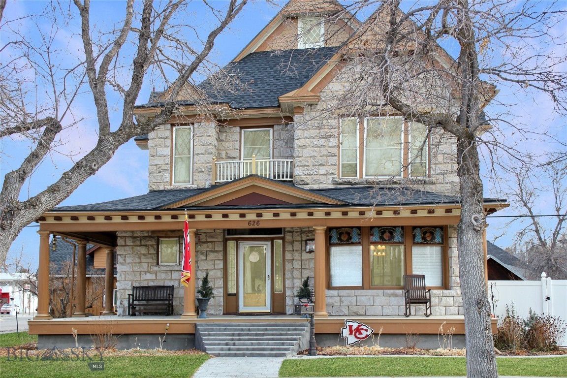 Welcome to the grandeur of the past, seamlessly blended with modern comfort, at 626 South Pacific, a stately stone mansion nestled in Dillon, Montana's historic home district. Built in 1900, this exquisite property boasts an impressive .33 acres of land, offering a perfect blend of privacy and accessibility.
Ideal for both investors and families, this historic 5-bedroom, 2.5-bathroom home invites you in with a beautiful wraparound porch, setting the stage for the elegance within. The property includes a 2-bedroom/2-bathroom detached rental unit with a 100% rental history, perfect for additional income or as a mother-in-law suite.
Step inside to discover a treasure trove of original features, including woodwork throughout, stained glass windows that cast colorful patterns in the light, and a formal dining room and library for refined entertaining. The remodeled kitchen, equipped with top-notch appliances, bridges the past and present, while a wood-burning fireplace adds warmth and character to this historic home.
Two stories of living space, plus an attic and basement, offer ample room, while the intricately handcrafted original wood staircase with a charming window seat on the landing adds a touch of romance. The remodeled primary bathroom provides a modern retreat, and the backyard's privacy fence and mature trees ensure seclusion in the heart of the city.
Step outside to the entertaining area, where the original chandeliers add a touch of opulence to your gatherings. This executive home's fabulous location puts you within walking distance to the University of Montana Western and downtown Dillon's amenities, and just a stone's throw from Barrett Memorial Hospital.
Embrace a lifestyle of timeless elegance at 626 South Pacific, where history and luxury live in harmony.