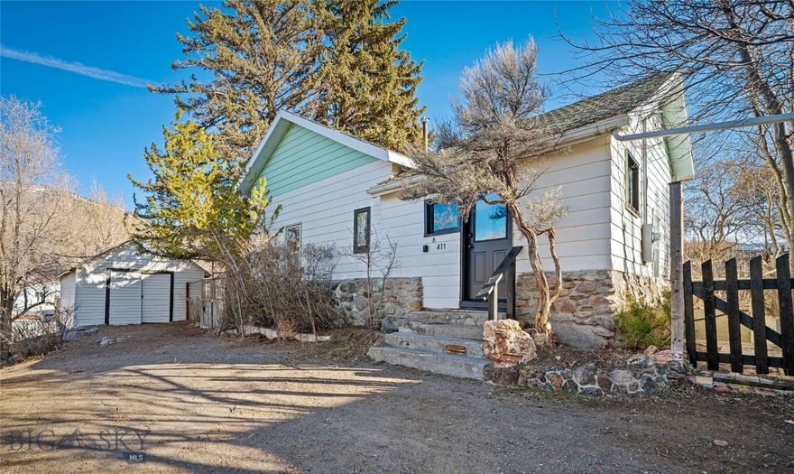 Nestled in the heart of the historic town of Gardiner, just steps from the iconic Roosevelt Arch & the northern entrance to Yellowstone National Park - the only entrance open year-round - this rare gem offers a front-row seat to one of the most breathtaking landscapes in the American West. Built in 1929, this FIXER-UPPER offers 2 beds/1 bath (1 bed non-conforming), & a 16x28 detached garage set on a generously sized lot that has witnessed nearly a century of Yellowstone history. Wake up each morning to elk & deer grazing in the yard, bald eagles soaring overhead, & the distant call of the river that winds through the valley below. From your front door, you’ll discover views of snow-capped peaks & the open expanse that has inspired generations of explorers. Homes in this coveted area of Gardiner rarely come to market — & for good reason. With its unbeatable location, rich history, & front-row access to Yellowstone’s wonders, 411 Stone Street is more than a property; it’s a piece of living heritage. Whether renovating to recapture its original historic charm or rebuilding to create your own modern mountain retreat, the possibilities are as endless as the views. The lot’s unique positioning and sightlines make it an ideal setting for a home that captures the spirit of Montana living — bold, beautiful, & enduring. Just beyond the Roosevelt Arch once ran the famed Northern Pacific Railway, whose arrival transformed Gardiner into the official Gateway to Yellowstone. This very neighborhood grew in response to the railway’s presence — & 411 Stone Street stands within that historic footprint. Come discover the magic of Gardiner — where history, wilderness, and home meet in perfect harmony.