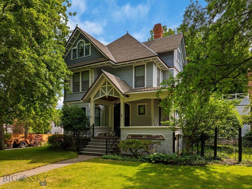 Welcome home to 604 S Willson. This Historic Preservation Award of Excellence winning, well-maintained 1904, 4 bedroom, 3 1/2 bath, 4,556 sq ft home with 2-car carriage house, w/ roughed in 732 sq ft bonus space above has not been on the public market for over 80+ years. This stately, architecturally designed Queen Anne Craftsman is nestled on a corner knoll in Bozeman’s charming, historic S Willson neighborhood, 5 blocks from Bozeman’s downtown, Main St, moments from the MSU campus, the Sourdough/Gallagator Linear Trail system, recreation, & all things Bozeman. Having not exchanged ownership in 50+ years, this turn of the century residence features 3 stories in addition to a basement level, an oasis of a backyard, mature landscaping, English gardens, irrigation well & historic custom designed hand-wrought iron hand rails, gates, & fencing. The property's 2-stall carriage house, boasts workshop space up front, an I-beam installed w/ a chain hoist for heavy lifting, 220v electrical, storage for outdoor gear, side off-street parking, & alley access in the back. The carriage house's 732 sq ft upstairs bonus area is prime for additional guest quarters, home office or artist’s studio. Every inch of this property offers character & a sense of Bozeman’s history; from the welcoming wrap-around covered front porch, original hardwood finishes & floors, leaded glass, & other preserved accents. The homes spacious completely-private backyard is ideal for hosting events, entertaining, or simply relaxing & unwinding & provides a grand arboreal canopy, a large back deck & fabulous 2nd-level sun deck overlooking the private outdoor oasis. With main level kitchen, dining, & dual living areas, the home's layout flows effortlessly from room to room. The 2nd level provides a primary bedroom, 2 additional guest bedrooms, bath, large laundry area & sun deck access. The 3rd floor has a cathedral ceiling & offers addt'l space for guest bedrooms, has an ensuite bath & versatility whether utilized as cozy guest quarters, a home office, or creative space to suit other needs. The basement level has separate exterior access & an additional 1090 sq ft of storage, hobby space &/or is simply awaiting the vision of its next owner. This captivating home is locationally perfect to fully embrace Bozeman’s downtown lifestyle, shopping, dining, entertainment, & outdoor recreation. Don’t miss this once-in-a lifetime-opportunity to own this ideally located, downtown, University-centered property.