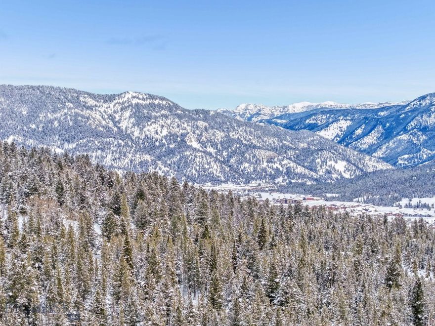 This two-acre homesite, located in the Ranches Neighborhood of Spanish Peaks Mountain Club, is ideally situated just minutes from the Clubhouse, Montage Big Sky, and Big Sky's Town Center. The property offers a tranquil sense of privacy, thanks to an acre of open space at the back and additional surrounding open areas, complemented by old-growth trees. Enjoy eastern views of the Gallatin Mountain Range, creating a picturesque setting for your future residence.

Through the Social Membership with Spanish Peaks Mountain Club, you will have access to a variety of member amenities, including dining, a bar, a workout facility, and men's and women's locker rooms with private access to the pool and hot tub. The membership also provides preferred access and discounts to Montage Big Sky and the soon-to-open member lodge, Aspire. Aspire will feature elevated dining experiences, a bar, a pizza kitchen, comprehensive fitness programs, and family-friendly recreational options, seamlessly blending luxury and lifestyle.

Additionally, the Social Membership grants limited access to the Tom Weiskopf-designed 18-hole Championship Golf Course, as well as the new 10-hole Tom’s Par 3 Golf Course. Both courses are complemented by the adjacent Clubhouse, which includes a pro shop and all the amenities you'd expect from a world-class golf facility.

This is an exceptional opportunity to experience the ease of luxury living at Spanish Peaks Mountain Club. Don’t miss the chance to see this remarkable homesite in person!