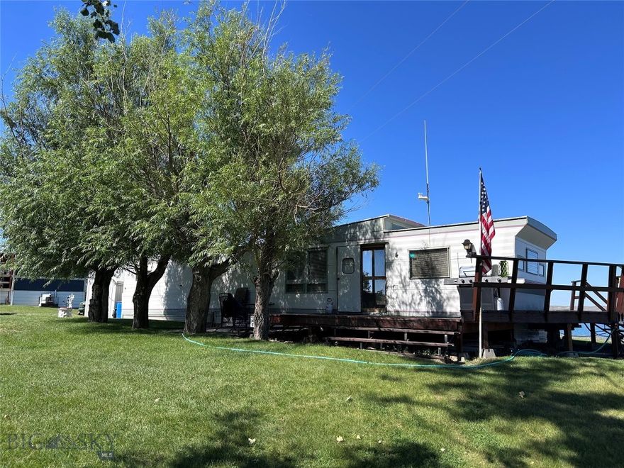 Experience Unmatched Lake Life at Rock Creek Marina – Your Home Away From Home on Fort Peck Lake
Step into the heart of Fort Peck Lake’s vibrant waterfront community with this charming 2-bedroom, 1-bath retro trailer, perfectly positioned on a leased lot at Rock Creek Marina overlooking the serene Rock Creek Bay.
This isn’t just a place to stay — it’s a lifestyle. Known for world-renowned fishing, Fort Peck Lake draws anglers from all over seeking trophy-sized walleye, northern pike, and perch, just to name a few. Whether you’re a seasoned fisherman or just love the thrill of casting a line from your own private dock, this marina offers unparalleled access to some of the best fishing in the region.
Launch your boat with ease from the nearby boat ramp, then cruise across the lake’s expansive shoreline, exploring hidden coves or enjoying peaceful sunsets on the water. The marina itself is a welcoming community hub, where neighbors become lifelong friends and family traditions are born. Enjoy laid-back days on the docks, evenings swapping stories by the campfire, and spontaneous gatherings that capture the true spirit of lakeside living. Your trailer comes fully furnished, ready to serve as your cozy retreat after a day of outdoor adventures. But the real treasure is your private dock and boat slip, your personal gateway to the water and all the recreational opportunities Fort Peck Lake has to offer.
Whether you’re here to fish, boat, relax, or simply connect with nature and community, Rock Creek Marina offers an unbeatable blend of tranquility and camaraderie in one of Montana’s most beloved lakefront destinations.
Embrace the lake life you’ve been dreaming of—reach out today to learn more about making Rock Creek Marina your new home away from home.