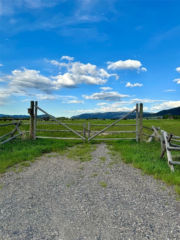 Privacy and unbelievable views! Bring your horses to this 24.63 acre lot in the private, esteemed North Ridge Ranch, bordering Triple Tree Ranch, south of town. You can enjoy proximity to downtown Bozeman, while also enjoying the solitude, serenity and wildlife of this rare find at the end of Jack Leg Road. Stunning views you have to see to believe, including surrounding mountains and valley. Fully fenced, windmill, horses allowed, horse shed, paved roads, and power to property with a well already in place. A hidden gem and rare opportunity to own a very special piece of Montana.