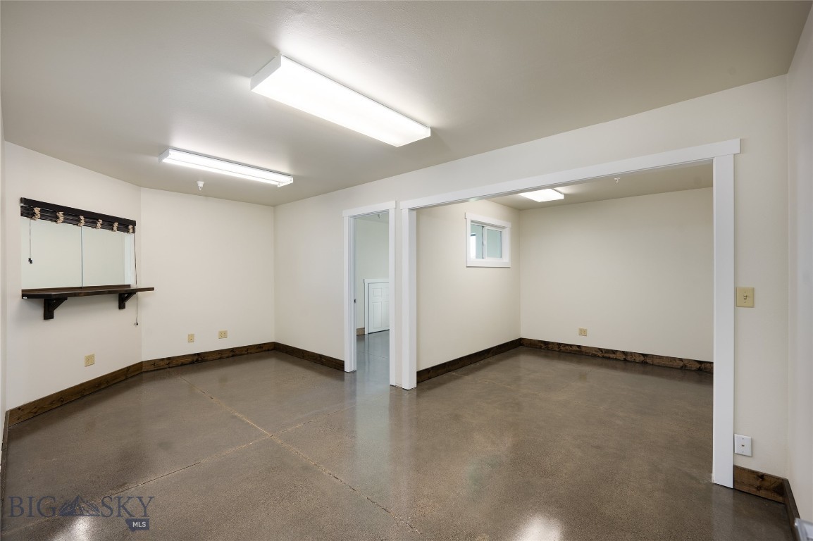 This is a large building on the North side of Belgrade near new neighborhoods with easy access to the airport and all that Belgrade has to offer. This property has many possibilities including the ability to be a private school, church, business offices or manufacturing. There is 8927+/- sf of office space split between two floors. There is an additional 7818+/- sf of warehouse space that could be utilized by one tenant or rented to a separate tenant. Take advantage of a large parking lot and good exterior lighting. This building is vacant and ready to go. Also listed as MLS#404255