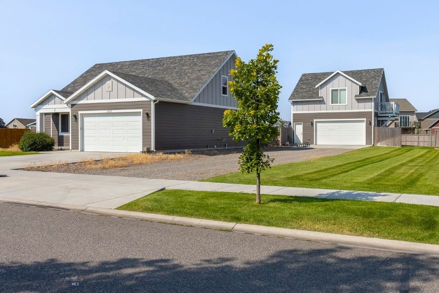 2 HOMES AND A GREAT VALUE! A wonderful custom 2,580 sq. ft. 3-bedroom home with an additional 500+ sq. ft. 1-bedroom apartment/accessory dwelling unit (ADU) above a detached finished 2-car garage. A nice setup for kids, in-laws or to produce income or a multi-generational lifestyle. The stylish main floor living has 2 bedrooms with a full bath plus an elegant master bedroom suite with tiled shower, soaking tub, walk-in closet, quartz counters and twin vanities. Both guest bedrooms have walk-in closets. The home has a spacious open feel with tray ceilings and 9' ceilings. The inviting kitchen with an open design concept features quartz countertops and island; stainless steel appliances; pantry; separate laundry, and gas fireplace. The upper flex room with mountain views is spacious and perfect for many activities. The dining area access to the beautifully landscaped half-acre fenced yard provides a relaxing getaway. All the homes are on large lots and provide plenty of neighborly elbow room and "Big Sky" views! 24 hour notice now as there is a tenant in the home.