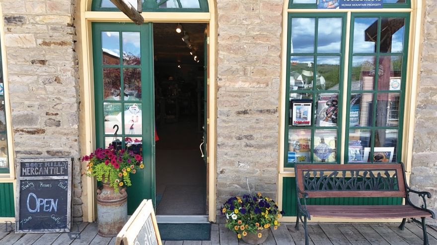 Original home of "The Madisonian Newspaper"
*** Boot Hill Mercantile presents a rare investment opportunity: a fully operational, turnkey business in the heart of historic Virginia City, MT — poised for immediate income and long-term growth. ***

Step into the legacy of Montana’s frontier days with Boot Hill Mercantile—a rare chance to own a historic Main Street gem in the heart of Virginia City. Steeped in Gold Rush history, this iconic building offers timeless character and prime commercial potential.

Dating back to the mid-1800s, Boot Hill Mercantile once served as a bustling hub during Virginia City’s boomtown era. Today, it retains its original charm with a rustic stone façade, nostalgic signage, original hardwood floors, and vintage fixtures that evoke the true spirit of the Old West.

Ideally located in the town’s historic district, the 1,971 sq ft space sees steady foot traffic from tourists and locals alike. Its versatile layout is perfect for a general store, café, artisan shop, or even a small museum.

Currently operating as a thriving gift shop selling souvenirs, apparel, local books, art, and more. Sale includes the building, fixtures, and inventory at closing.

Whether you're continuing a beloved tradition or starting something new, Boot Hill Mercantile is your chance to own a landmark with unmatched history and opportunity.