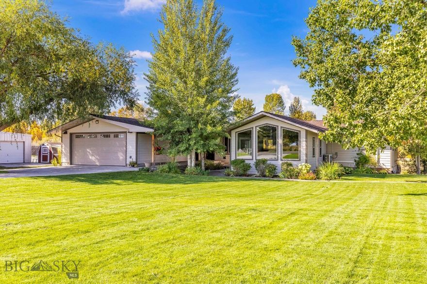 Country Living with Mountain Views – Fully Remodeled Home on 2.5± acres with brand-new ADU and shops.
Enjoy the best of both worlds with peaceful country living just minutes from Manhattan and the Gallatin River. This beautifully remodeled home (2021) sits on 2.5± acres with stunning Bridger Mountain views and every upgrade you can imagine. The main home features a vaulted tongue-and-groove ceiling in the living room, a bright and modern kitchen with updated appliances, walk-in pantry, and eat-in bar. The spacious main-level primary suite includes two large walk-in closets and a luxurious tiled shower. A huge guest bedroom with built-ins, a roomy laundry area with second fridge, and a walk-out basement with additional bedrooms, family room, and ample storage make this home as functional as it is beautiful. A brand-new (2025), never-used 1-bedroom ADU offers additional living space or rental income potential, complete with full kitchen, living area, bathroom/laundry, and its own separate entrance. Outdoor living shines with a large covered deck, expansive patio, mature landscaping, and vibrant perennial gardens. The property is handicap accessible and thoughtfully designed for both comfort and utility. Outbuildings include a charming dairy barn/garden shed, greenhouse, chicken coop, open-front hay/equipment shed, a 36' x 72' shop with front and rear lean-tos, and a 30' x 60' heated, insulated shop with a 12' x 50' lean-to—wired for welding and ready for any project. Fully solar-powered with storage capacity to operate independently for 5–7 days without sunlight.