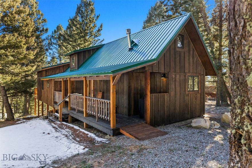 Opportunities like this rarely come along. Set at the base of the iconic Crazy Mountains, this beautifully updated cabin offers a truly rare level of access to Montana wilderness—within walking distance to thousands of acres of Forest Service land, trailheads, and high mountain lakes. Properties with this kind of proximity to protected public land are increasingly hard to find, making this an exceptional and limited offering.

Situated on 3.2 private acres, the cabin has been thoughtfully updated within the last year, including a recent addition that blends modern comfort with timeless, vintage-inspired touches. The interior features three bedrooms, two and a half baths, a full kitchen, and warm, inviting living spaces anchored by a charming gas stove—perfect for cozy evenings with a good book after days spent exploring.  The primary bedroom opens to a private deck with sweeping views of the Crazy Mountains, an ideal spot to greet the morning or unwind at sunset.

Cottonwood Creek runs through the corner of the property, adding to the peaceful, natural setting. A dry bunkhouse provides additional space for guests, while a fire pit invites evenings under Montana’s expansive, star-filled skies. The cabin is tied to power, and a heat pump added in 2025 offers efficient heating and cooling for the primary bedroom.

Outdoor recreation is truly at your doorstep—fly fishing, hunting, hiking, wildlife watching, and access to vast stretches of public land are all just steps away. Access is via a Forest Service road, making the property seasonal unless you have a snowmobile or track vehicle, though there has been winter access by car this winter.  The plumbing is not currently configured for winter use but could be modified if year-round use is desired.

Quiet, private, and surrounded by wilderness, this is the kind of Montana retreat that seldom becomes available. A rare chance to own a legacy cabin in one of the state’s most sought-after and tightly held mountain settings at the doorstep of the Crazy Mountains.