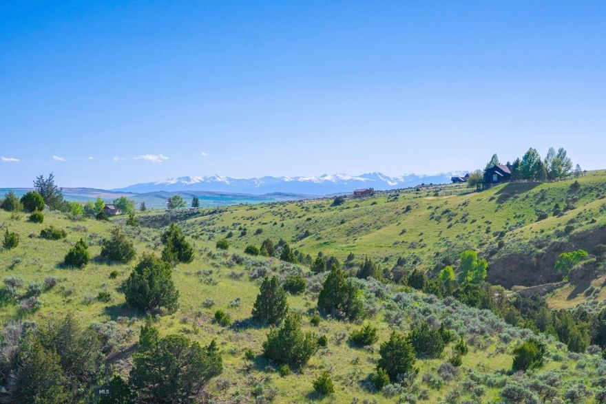 Great parcel in close proximity to Gallatin River Ranch's entrance. Place your home on a hilltop to take in Bridger Mountain views and Manhattan's iconic massive rock outcropping, Castle Rock. This 20+ acre parcel ideally accommodates a solar home. It's only a mile to neighborhood's private Gallatin River access. Bring your friends and float the Gallatin or fly fish. You're also granted access to 640 acres state land that adjoins the west side of nieghborhood. Enjoy the beautiful rural setting while being 30 minutes outside of Bozeman! Call for a ranch tour today.