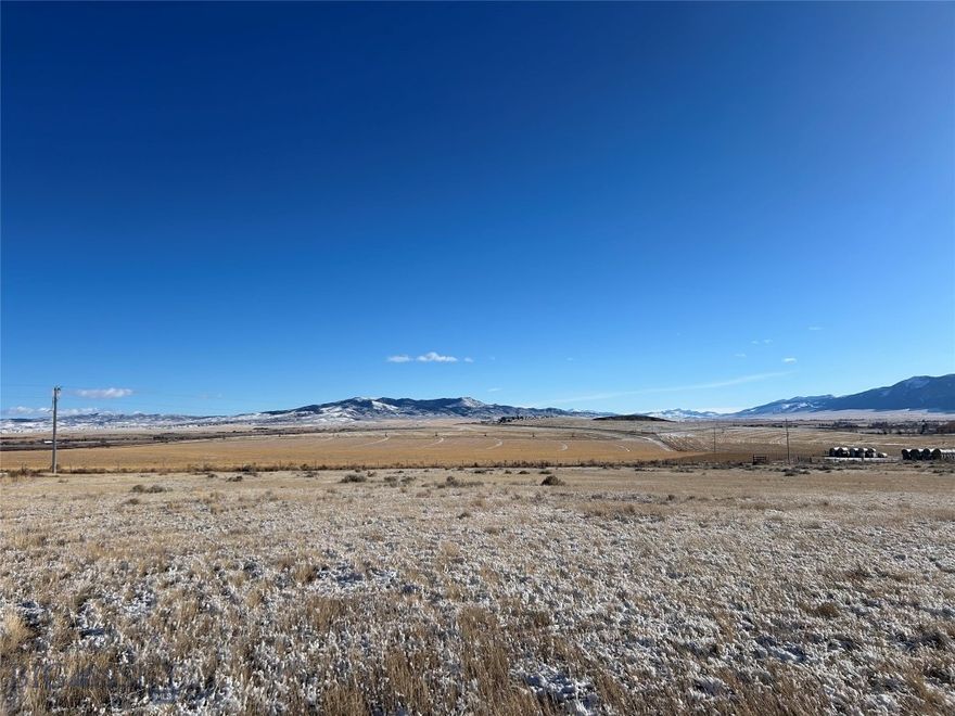 This is your opportunity to own 5.04+/- acres with sweeping mountain views, where wide-open skies and abundant wildlife create a true western retreat. Perfectly positioned just 15 minutes from town, this property delivers the ideal balance of privacy and convenience. Enjoy quick access to dining, shopping, and services—then return home to peace, quiet, and unforgettable sunsets. Outdoor enthusiasts will love the excellent fishing, hunting and skiing nearby, making this an ideal location for your future dream home or getaway retreat. A well is already in place, saving significant time and upfront expense and adding immediate value for buyers ready to build. Up to five large animals are allowed, perfect for horses or 4-H animals. With usable acreage, breathtaking scenery, and infrastructure already started, this property is a rare offering in today’s market—perfect for a full-time residence or weekend getaway.