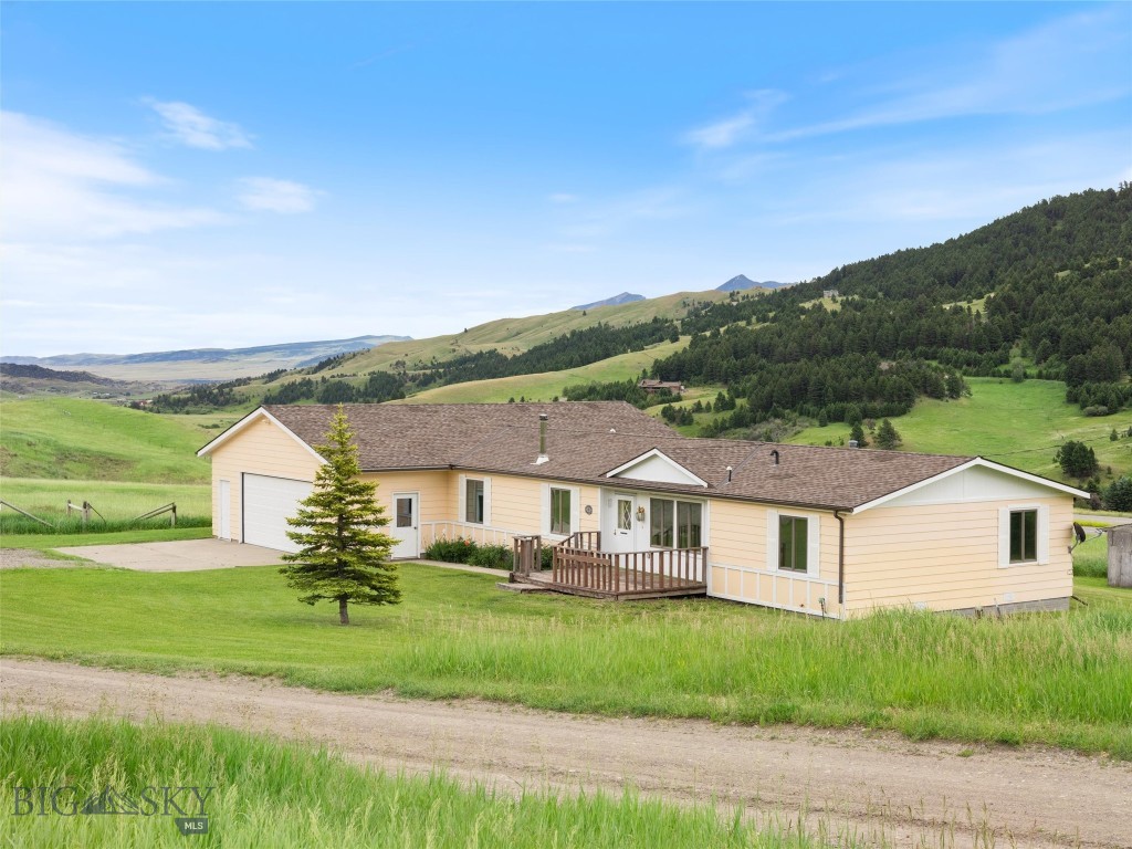 Single level home on acreage between Bozeman and Livingston! This one owner home sits on approximately 5 acres and is perfectly situated for convenience. The spacious 2,200 square feet offers 3 bedrooms, including a large master suite with its own full bathroom and private access to the backyard, plus 3 full bathrooms in total. Extra rooms provide ample space for entertaining, hobbies, or simply enjoying plenty of elbow room. The open, versatile floor plan makes this home ideal for comfortable living and gatherings. Attached oversized 2 car garage, plus additional storage room with plumbing, to secure your vehicles and extra storage. Bring your furry friends along - this pet friendly home offers the perfect environment for pets to thrive, with ample indoor and outdoor space to play and relax. Enjoy country living with convenient access to both vibrant towns. Fantastic opportunity to own a comfortable home on land in a great location.