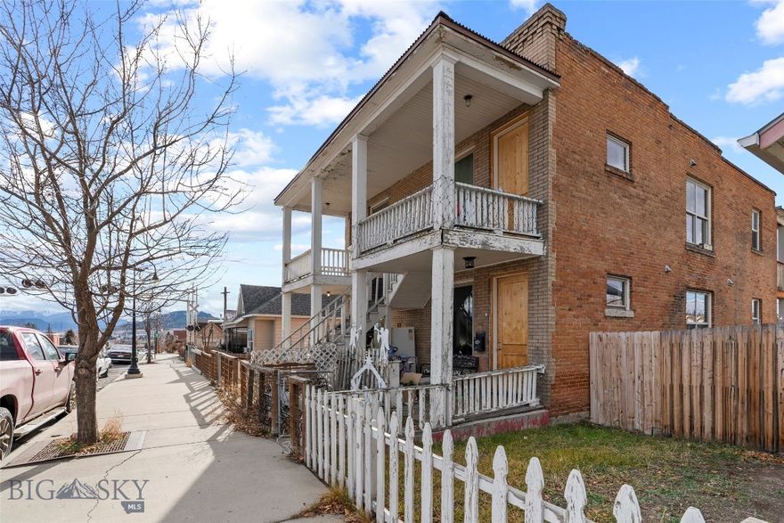 If your next move in Butte needs to be smart, simple, and income-focused—this is the one you put at the top of the list. Right in central Butte, this updated, move-in-ready townhouse is set up beautifully for rental income, owner-occupancy, or a solid long-term hold. Unit 1 gives you 3 bedrooms, 2 bathrooms, and 1,494 sq. ft. of comfortable, practical living space. Originally built in 1919 and updated, it features an upgraded kitchen, modern bathrooms, refreshed flooring, and clean, simple finishes throughout. You get that classic Butte charm with the covered front porch and the bonus of alley access out back for extra parking. Close to Uptown Butte, parks, schools, local shops, and everyday amenities, this location checks all the boxes for renter appeal and long-term stability. If you’re looking for a straightforward, dependable property that actually pulls its weight in your portfolio, this one’s ready to go.