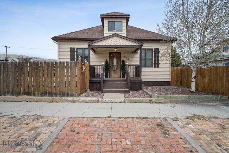 Beautifully renovated 3,312 sq ft home on a rare 11,500 sq ft double lot just blocks from downtown. This move-in-ready property blends classic character with modern updates, featuring a stunning, highly sought-after kitchen and formal dining room just off the kitchen—perfect for entertaining. Main floor includes a spacious primary suite with bathroom and spa-inspired walk-in shower, plus an office or bonus room. Upstairs offers two large bedrooms and a half bath. The finished basement includes a large laundry room, abundant storage, and two additional egress bedrooms—currently used as a family room and craft space. Enjoy a walk-out deck off the kitchen, paved off-street parking, and a private fenced yard. Outdoor wood-burning system provides efficient primary or supplemental heat for the home. Rare space, thoughtful updates, and a prime location—don’t miss this one!