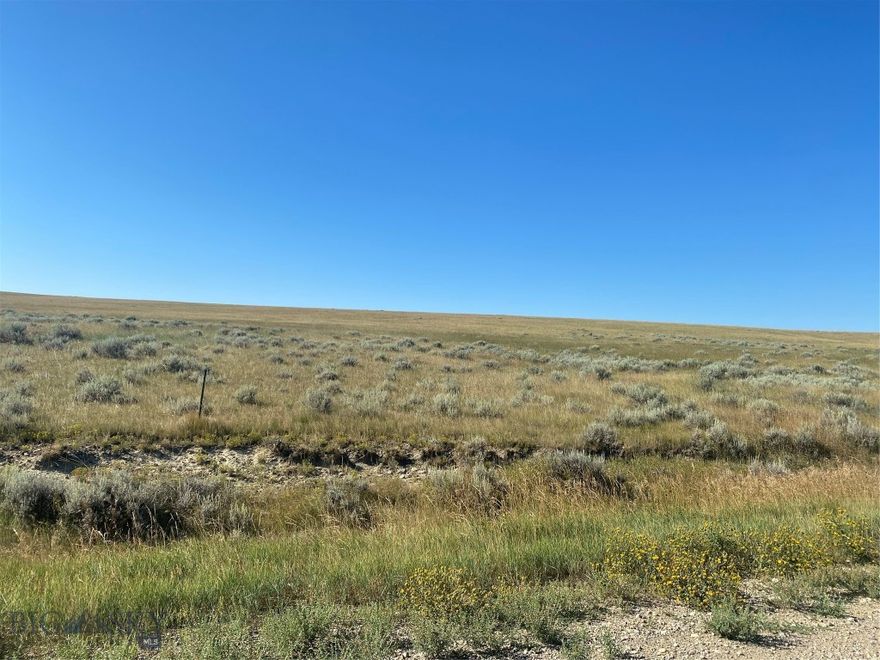 20+/- acres with panoramic views of the Snowy Mountains and valley near Deadman's Basin for boating and fishing.